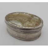 A LATE 19TH CENTURY SILVER AND MOTHER OF PEARL BOX, oval form, the hinged cover inset with carved