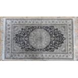 A PERSIAN PART SILK RUG, stylised floral decoration on a cream and blue ground 155 x 91 cm