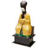 CHINESE SANCAI-GLAZED SEATED OFFICIAL, KANGXI PERIOD (1664-1722) the seated official in robes with
