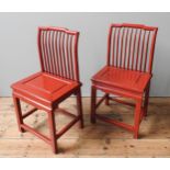 A PAIR OF CHINESE RED LACQUER CHAIRS, spindle backs, late Qing Dynasty 94 x 39 x 37 cm