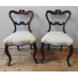 FIVE 19TH CENTURY ROSEWOOD DINING CHAIRS, Acanthus carved hoop backs and back rails, on cabriolet