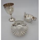 A SILVER GOBLET, SILVER ENTRE DISH AND A SILVER SAUCEBOAT, the goblet of simplistic form (16 cm