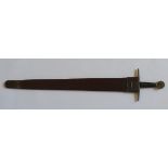 A THEATRICAL REPLICA OF A MEDIEVAL SWORD, broad blade, leather and metal wire grip, large circular