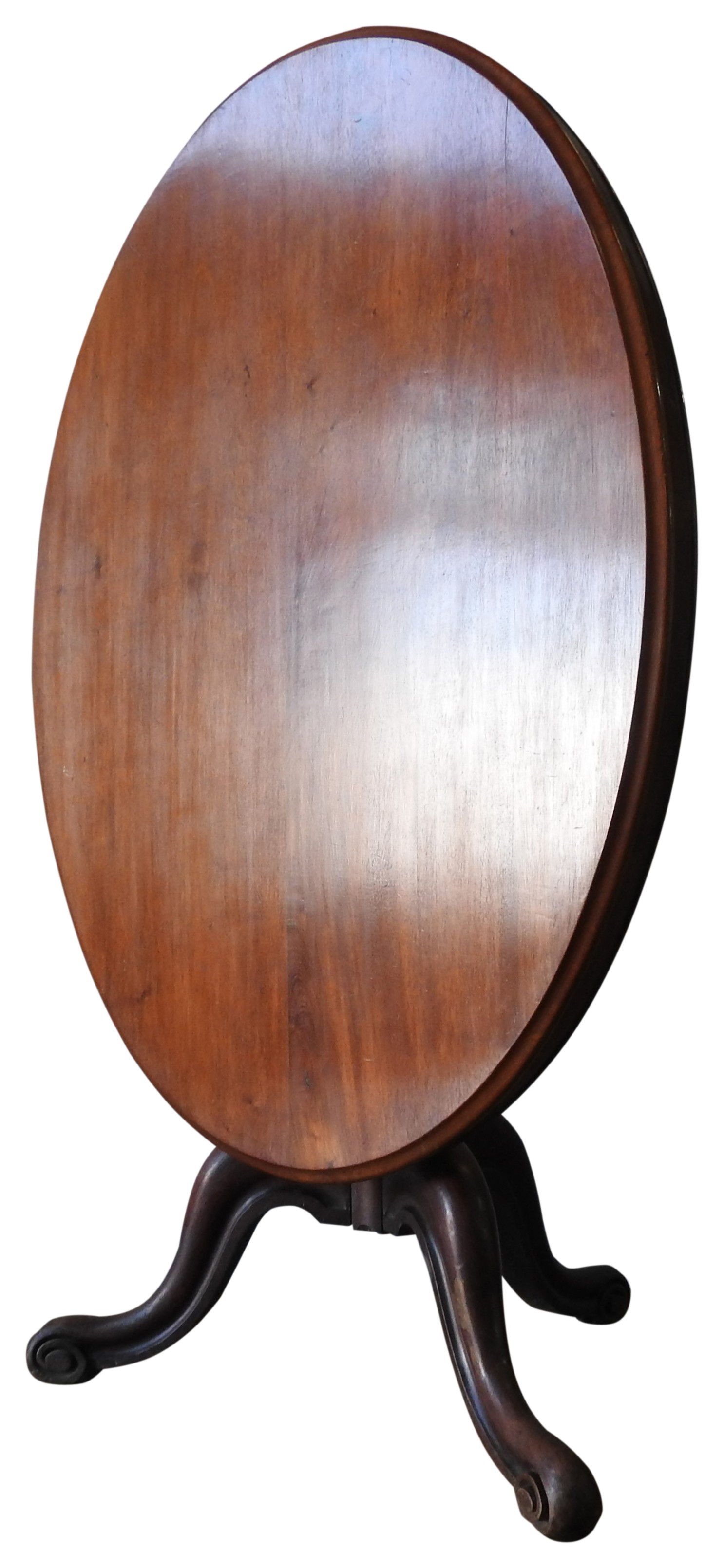 A 19TH CENTURY MAHOGANY LOO TABLE, tilting oval top on a turned baluster base on three down swept