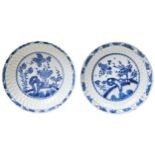 PAIR OF SMALL LOTUS-PETAL MOULDED BLUE AND WHITE DISHES KANGXI PERIOD (1662-1722) each painted in