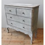 A LAURA ASHLEY CHEST OF DRAWERS, Gustavian style with superb distressed paint finish, two short