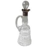 A EDWARDIAN CUT GLASS CLARET JUG, with tricorn silver collar/spout, bears the mark of Thomas