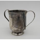 A SILVER CHRISTENING MUG, two handled, bears the mark of William Bateman, London, 1822, 9 cm high,