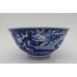 A CHINESE BLUE & WHITE 'DRAGON' BOWL., 20th century, with apocryphal Kangxi six character, 16.5 cm