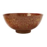 FINE GILT-DECORATED IRON-RED 'LOTUS AND BATS' BOWL DAOGUANG SEAL MARK AND POISSIBLY OF THE PERIOD