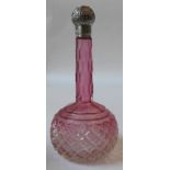 A 19TH CENTURY CRANBERRY GLASS BOTTLE, hobnail cut globular body with a slender faceted neck, with a