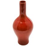 CORAL-RED BALUSTER VASE LATE QING DYNASTY covered in a a mottled rich coral-red glaze, apocryphal