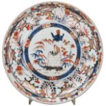 JAPANESE IMARI DISH EDO PERIOD, 18TH CENTURY centrally decorated with a bird perched on a cage
