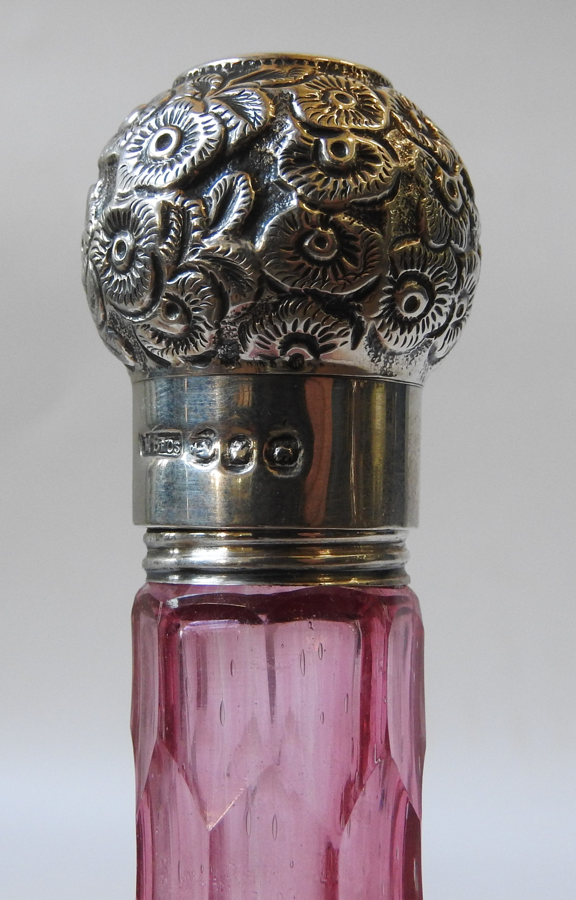 A 19TH CENTURY CRANBERRY GLASS BOTTLE, hobnail cut globular body with a slender faceted neck, with a - Image 2 of 2