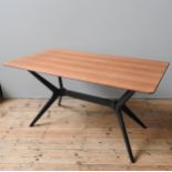 AN E.GOMME/G-PLAN MID CENTURY 'HELICOPTER' DINING TABLE, circa 1960, oblong teak veneer top on an