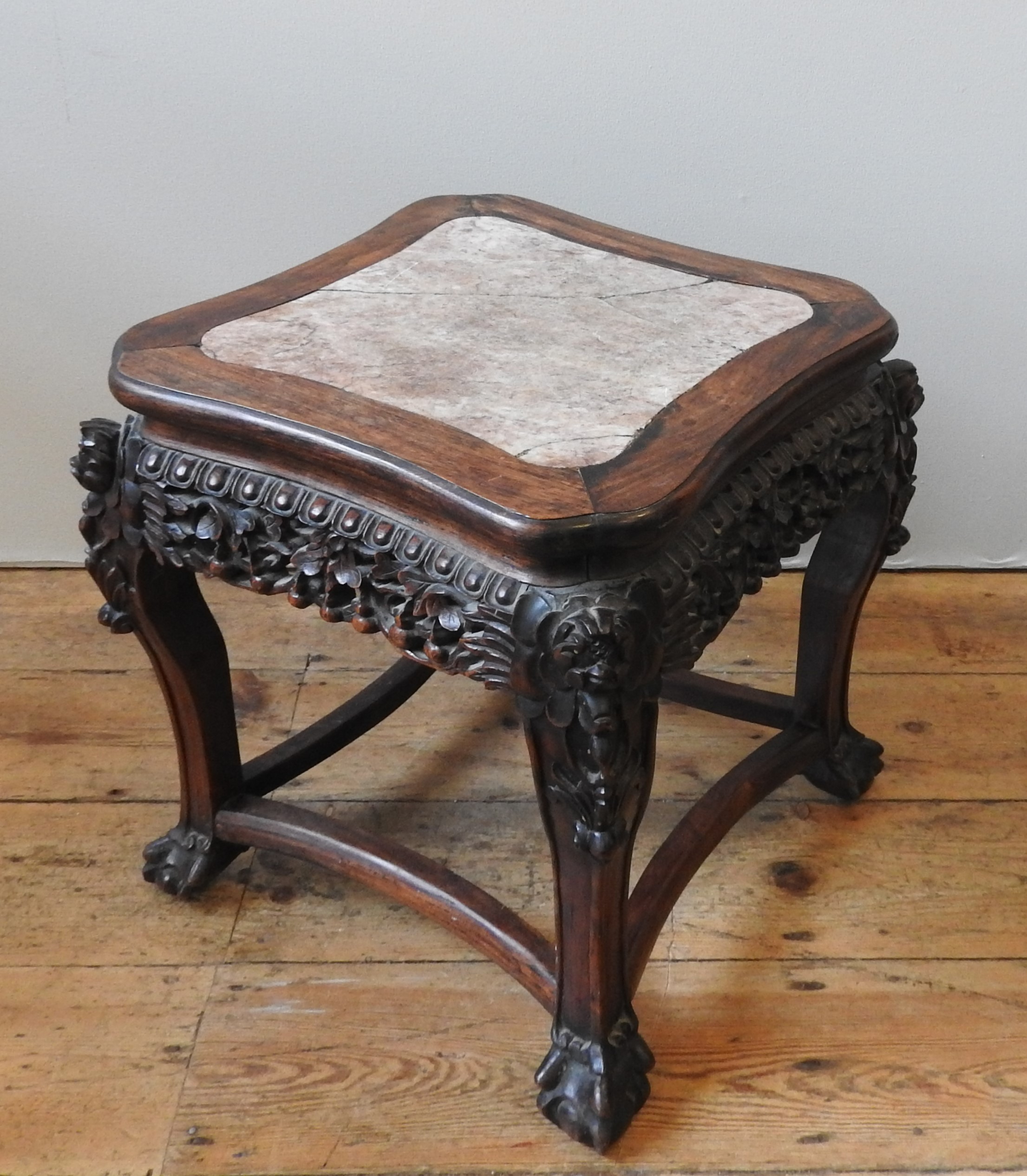 A CHINESE CARVED HARDWOOD MARBLE INSET STAND, Qing dynasty, 19th century, shaped square top with