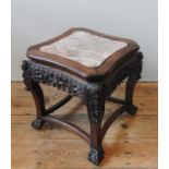 A CHINESE CARVED HARDWOOD MARBLE INSET STAND, Qing dynasty, 19th century, shaped square top with