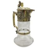 A VICTORIAN SILVER GILT MOUNTED CLARET JUG, the glass body etched with fruiting vines, the collar,