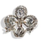A VICTORIAN DIAMOND SHAMROCK BROOCH, CIRCA 1880 the three old-cut diamonds, cut down collet set,