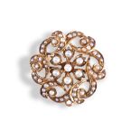 A LATE VICTORIAN PEARL AND GOLD BROOCH, CIRCA 1890 the central cluster of seven half pearls within a