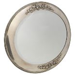 A SILVER FRAMED OVAL TABLE MIRROR, gadrooned edge frame with ribbon tied foliate decoration, oak