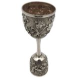 A CHINESE EXPORT SILVER SPIRIT MEASURE, circa 1900, with engraved prunus decoration, 12 cm long,