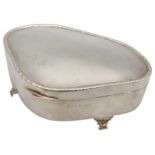 A SILVER RING BOX, curved tapered form with plush lined interior and beaded edge lid, raised on four
