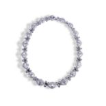 A DIAMOND NECKLACE the eighteen graduating openwork lozenge links set throughout with brilliant-