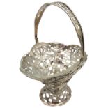 AN ELEGANT SILVER SUGAR BASKET WITH SWING HANDLE, pierced floral and lattice decoration, continental