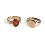 A VICTORINAN HARDSTONE CAMEO RING AND A SIGNET RING the hard stone cameo ring depicting a Roman