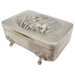 AN ART NOUVEAU STYLE SILVER RING BOX, oblong form with plush lined interior, raised on four