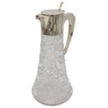 A SILVER MOUNTED GLASS CLARET JUG, the tapered body decorated with a graduated cut cane pattern, the
