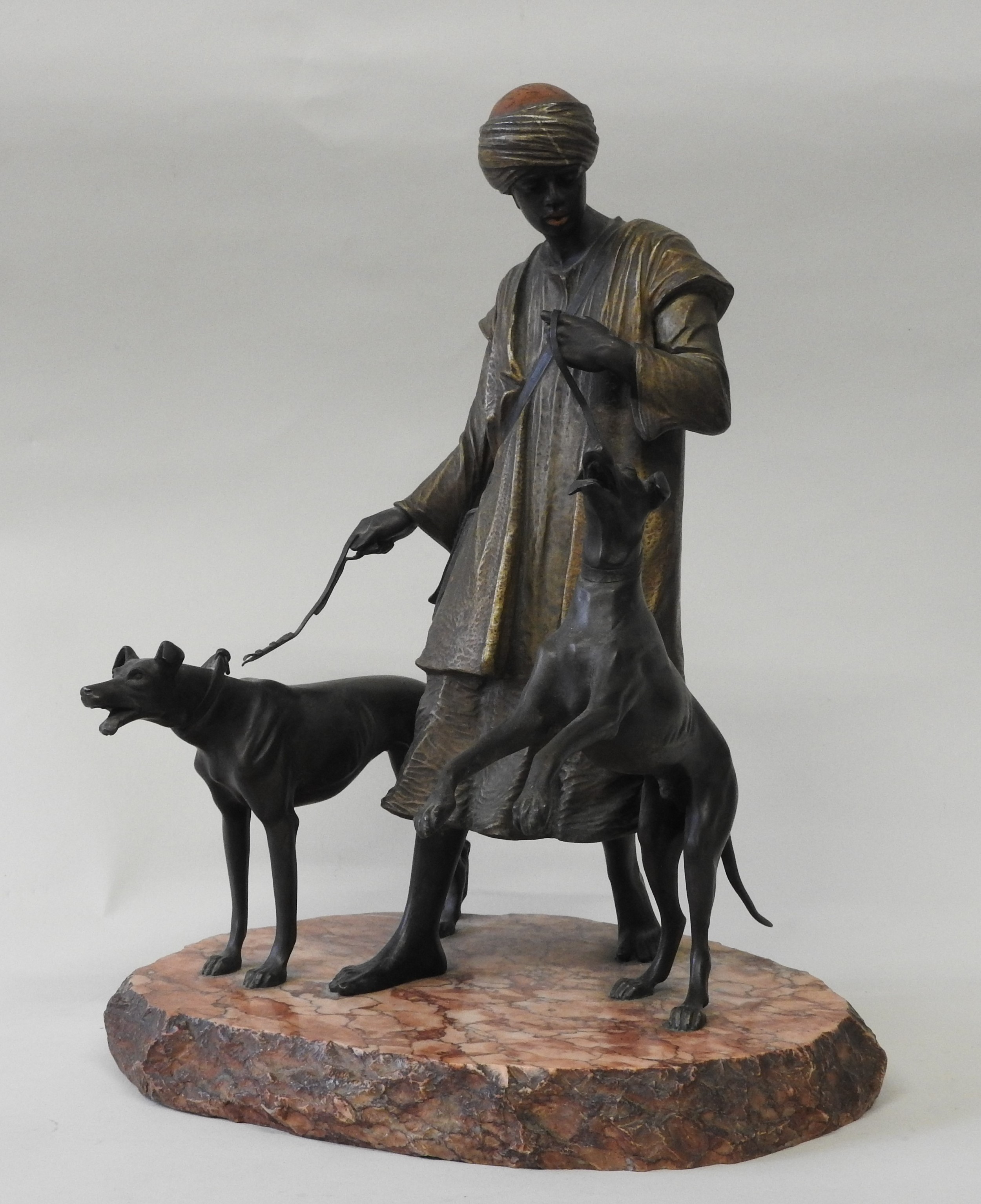 AFTER FRANZ XAVIER BERGMANN, A COLD PAINTED AND PATINATED BRONZE, depicting an arab figure with