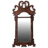 AN ENGLISH WALNUT FRET CARVED PIER MIRROR, EARLY 19TH CENTURY circa 1830 elegant scroll work