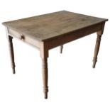 A RUSTIC PINE KITCHEN TABLE, 19TH CENTURY, rectangular top with single end frieze drawer, raised