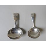 TWO SILVER CADDY SPOONS, 18TH/CENTURY, the larger fiddle pattern spoon marked London 1851 (