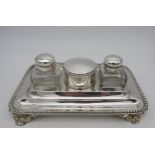 A SILVER INK STAND, rectangular form with beaded edge, square cut recesses for the two square form