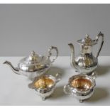 A SILVER FOUR PIECE TEA SERVICE, compressed melon form with alternating repousse decoration