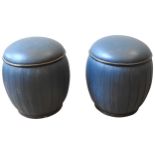 A PAIR OF RETRO OTTOMAN STOOLS, 20TH CENTURY, barrel shape with pleated blue leatherette covering,