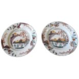 A PAIR OF DELFT POLYCHROME PLATES, 18TH CENTURY, depicting a traditional Chinese mountain village