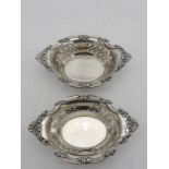 A PAIR OF EDWARDIAN SILVER BON BON DISHES, CIRCA 1901 oval form with scroll foliate edge and pierced