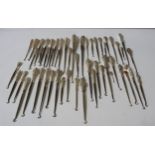 A LARGE COLLECTION OF VICTORIAN AND EDWARDIAN SILVER HANDLED BUTTON HOOKS, including novelty