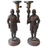 A PAIR OF VINTAGE CARVED OAK FIGURAL TABLE LAMPS, 20TH CENTURY, depicting robed Chinese monks with