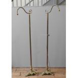 A PAIR OF EDWARDIAN FLOOR STANDING BRASS READING LAMPS, EARLY 20TH CENTURY, each lamp with an