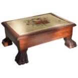 AN MAHOGANY & FRUIT WOOD FOOTSTOOL, LATE 19TH CENTURY, needlepoint panel top decorated with a floral