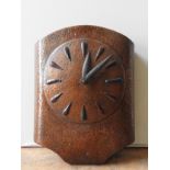 A VINTAGE ARTS & CRAFTS  WALL CLOCK, CIRCA 1920, hammered copper case, oblong form with canted