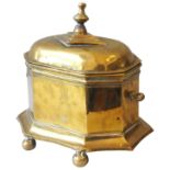 AN EARLY 19TH CENTURY DUTCH BRASS TOBACCO BOX, octagonal shaped sarcophagus form, the domed lid