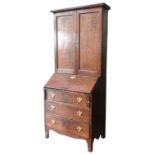 A GEORGE III OAK BUREAU BOOKCASE