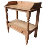A 19TH CENTURY WAXED PINE WASHSTAND, compact proportions, gallery top raised on turned baluster
