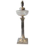 A LATE VICTORIAN SILVER PLATED CUT GLASS OIL LAMP, CIRCA 1896, cut glass reservoir sat atop an